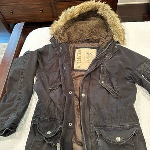 Hollister hooded jacket S-32 in. From shoulder to the bottom hem.